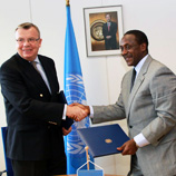 Photo: UNIDO Director-General Kandeh K. Yumkella (right) shakes hands with UNODC Executive Director Yury Fedotov at the signing ceremony