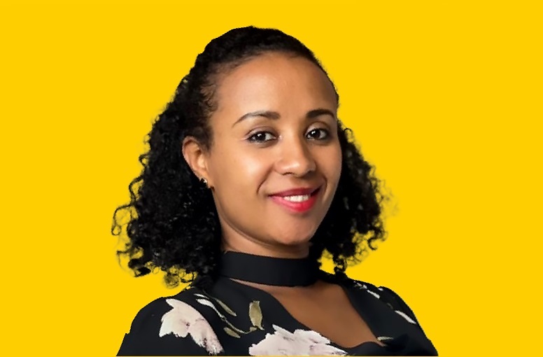 Portrait of Lelise Terfasa, Associate Programme Officer at the UNODC Programme Office in Ethiopia, on a yellow background