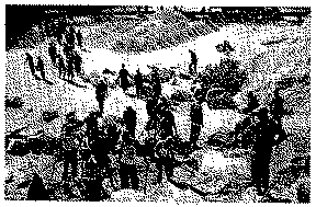 Full size image: 103 kB, A group of inmates working at stone-quarrying