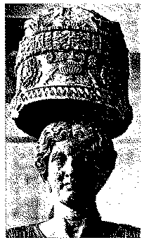 Full size image: 86 kB, 26. The Caryatid of Eleusis balancing a basket, decorated with poppy-capsules, on her head