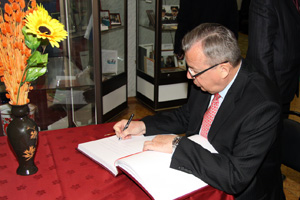 Photo: Mr. Fedotov signs a visitors' book