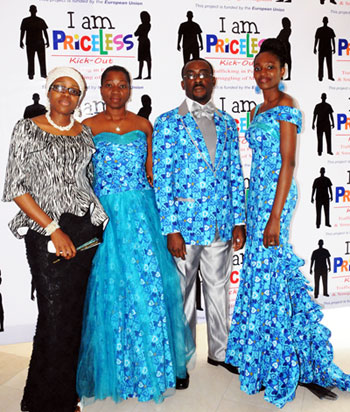Photo: UNODC Nigeria staff model outfits made from a customized Blue ...