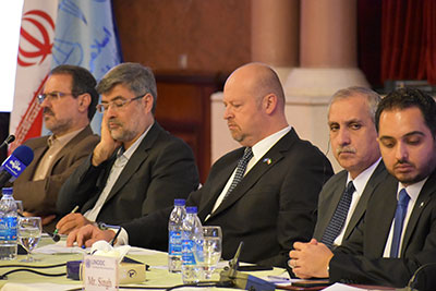 Picture of men at a conference tabel