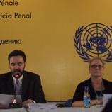 Imagem: John Sandage, do UNODC, lê a mensagem do Secretário-Geral da ONU aos participantes