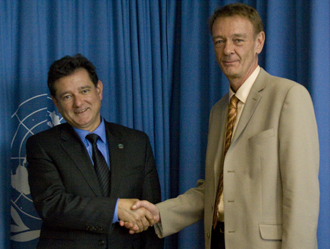 Photo:UNODC: Francis Maertens, Deputy Executive Director, UNODC (right), with Commissioner Carlos Castresana at the signing of the Memorandum of Understanding