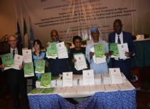 L-R: The Project Coordinator, Mr. Glen Prichard; the Officer-in-Charge of the UNODC Country Office in Nigeria, Ms Elisabeth Bayer; the Permanent Secretary, Federal Ministry of Health, Mr Clement Uwaifo; the NAFDAC Director General, Professor Mojisola Adeyeye; Deputy Chairman of House of Representatives Committee on Health Institutions, Hon. Mohammad Usman; and Director, Food & Drug Services, Federal Ministry of Health, Mr Mashood Lawal displaying the publications