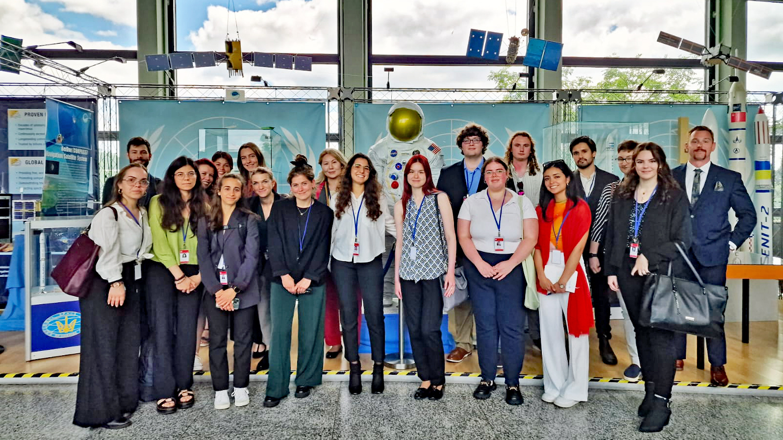 A group photo taken inside a building with students participating in the Summer School on Transnational Organised Crime.