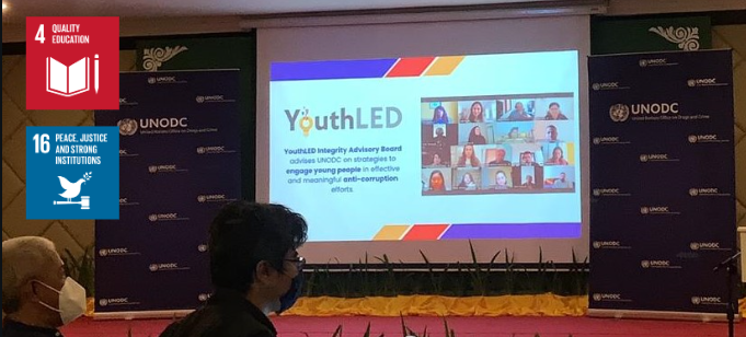 A presentation screen with the words, "YouthLED" featured. SDG 4 and SDG 16 are also featured on the side of the photo. 