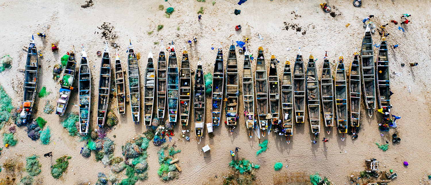 Fishing boats on sand beach