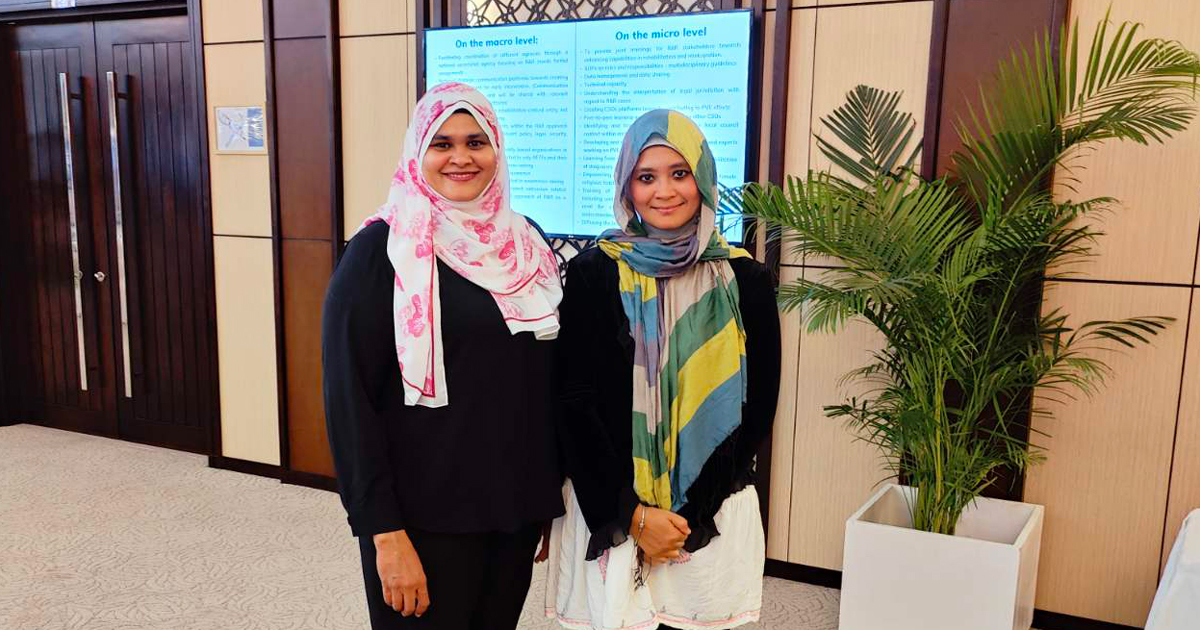 Shahu and a fellow participant at a UNODC-sponsored conference in the Maldives.
