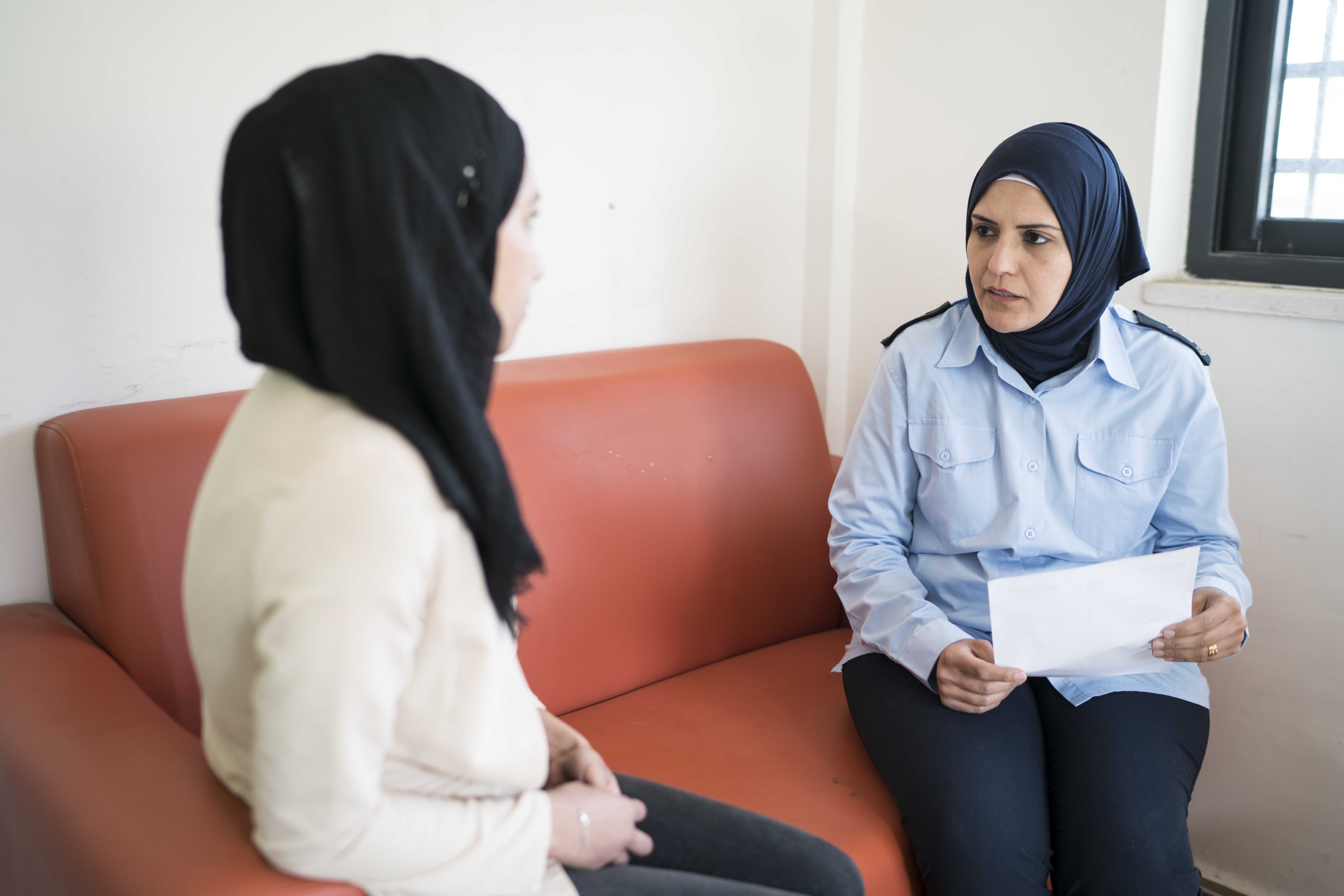 <p>At the Family Protection Unit, officers offer support to victims of gender-based violence, West Bank. Photo ©HAYA Joint Programme/Samar Hazboun</p>