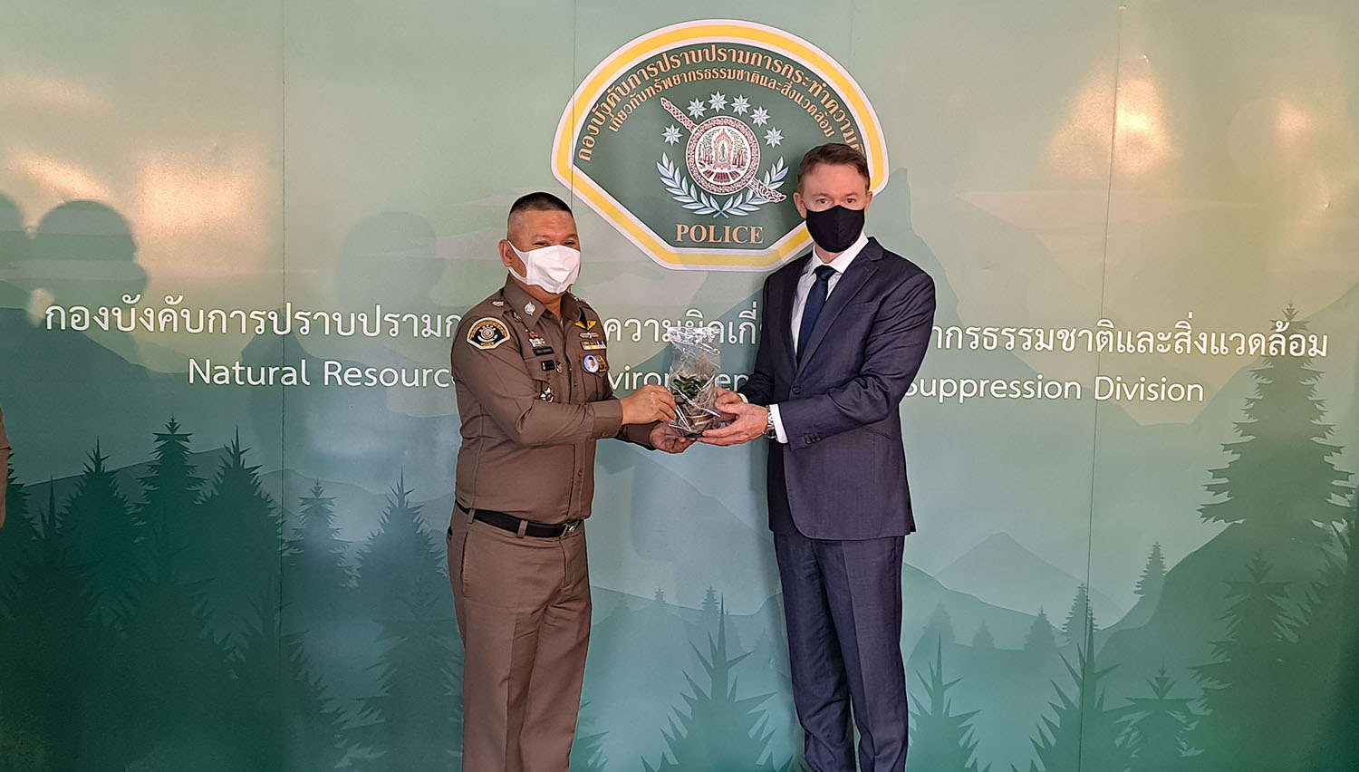 Regional Representative for Southeast Asia is the Pacific Jeremy Douglas is welcomed by NED Commander Pol. Maj. Gen. Pitak Utaitham. The seeding is an importants symbol of prosperity, a particularly important gesture for the NED on World Wildlife Day.