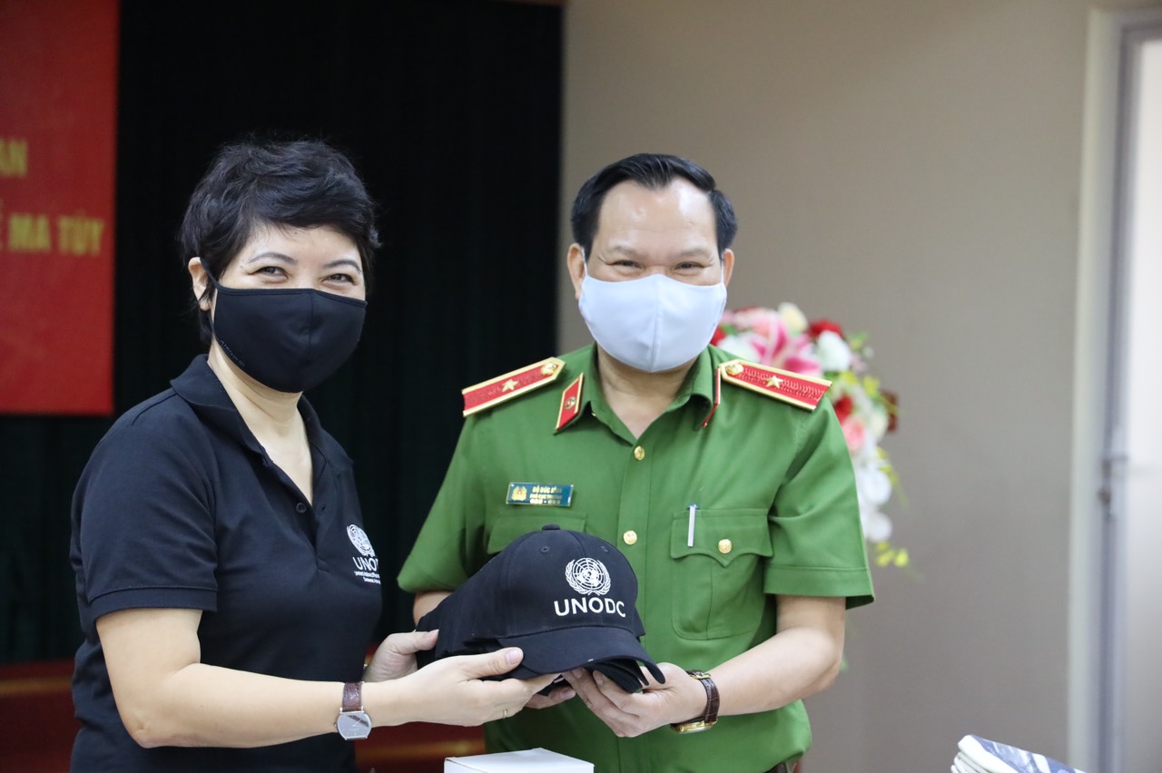 Ta Thi Bich Lien and Police Major General Do Duc Binh, Deputy Director General of the Counter-Narcotic Police Department of Vietnam in Hanoi, Viet Nam