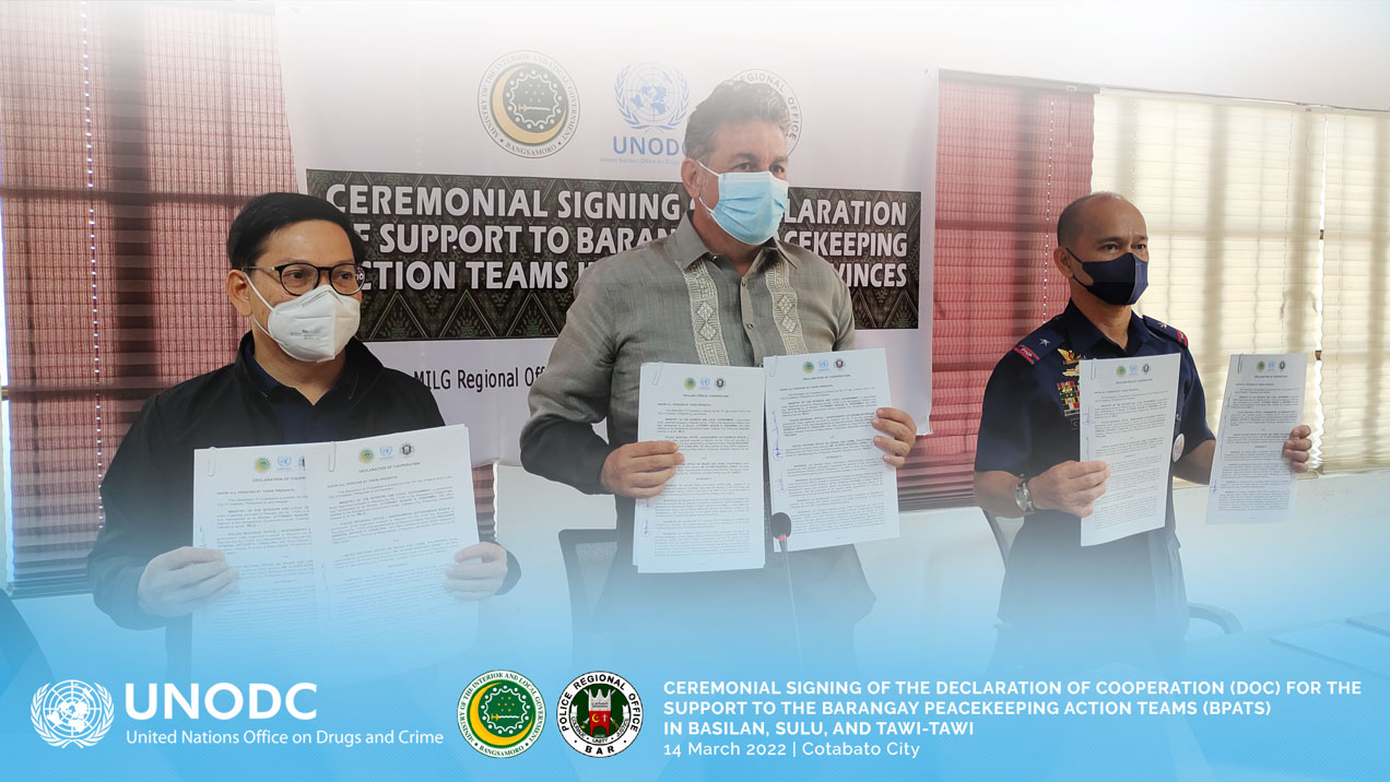 UNODC Senior Policy Advisor Olivier Lermet poses with MILG Minister, Attorney Naguib G. Sinarimbo and PRO-BAR Regional Director, Police Brigadier General Arthur R. Cabalona upon signing the Declaration of Cooperation for BPATs' strengthening in the provinces of Basilan, Sulu, and Tawi-Tawi