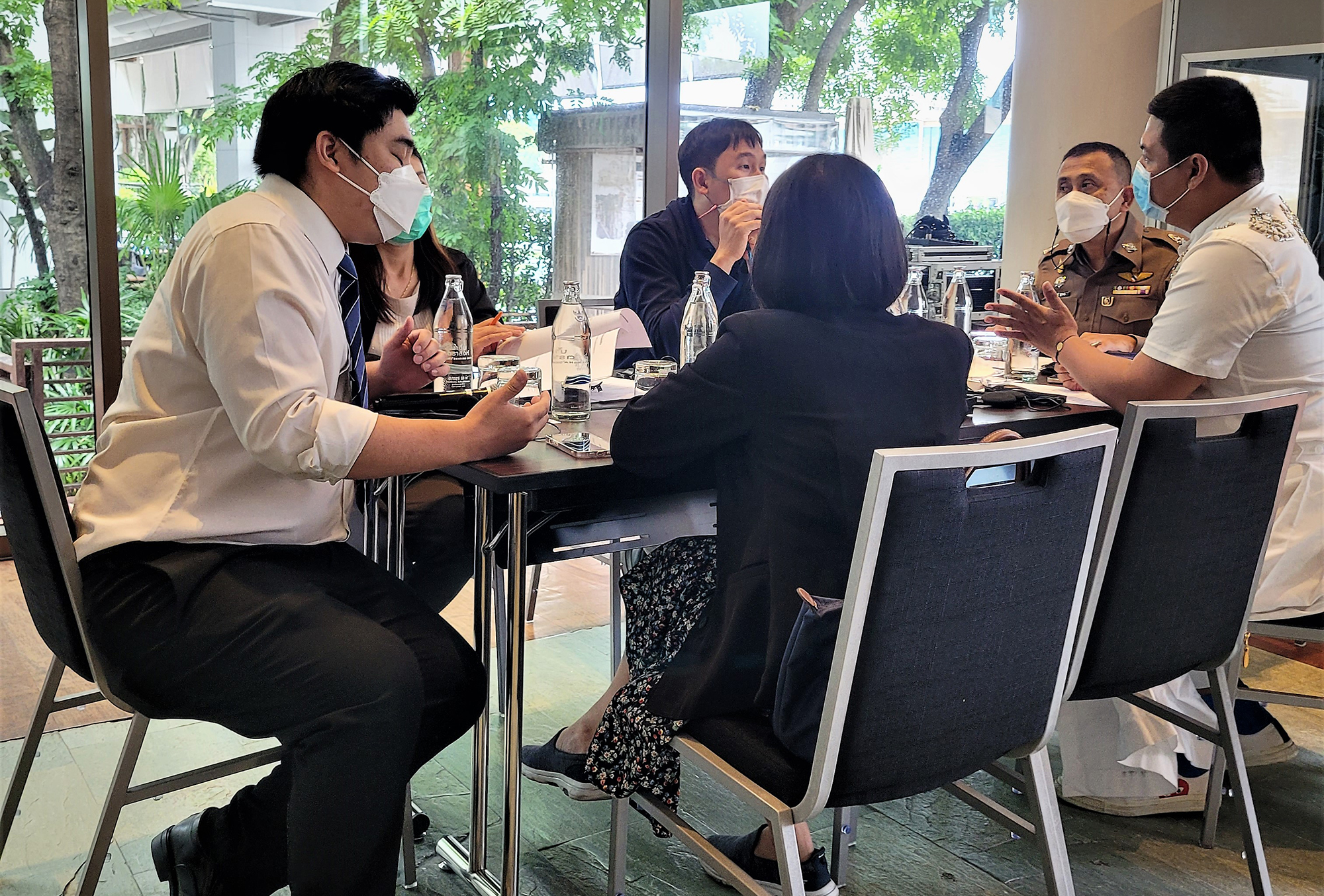 Participants from the Royal Thai Police, Bangkok Metropolitan Market, and Department of National Parks, Wildlife and Plant Conservation (DNP) discuss data collection from facilities handling wildlife in Thailand. (Credit: UNODC)